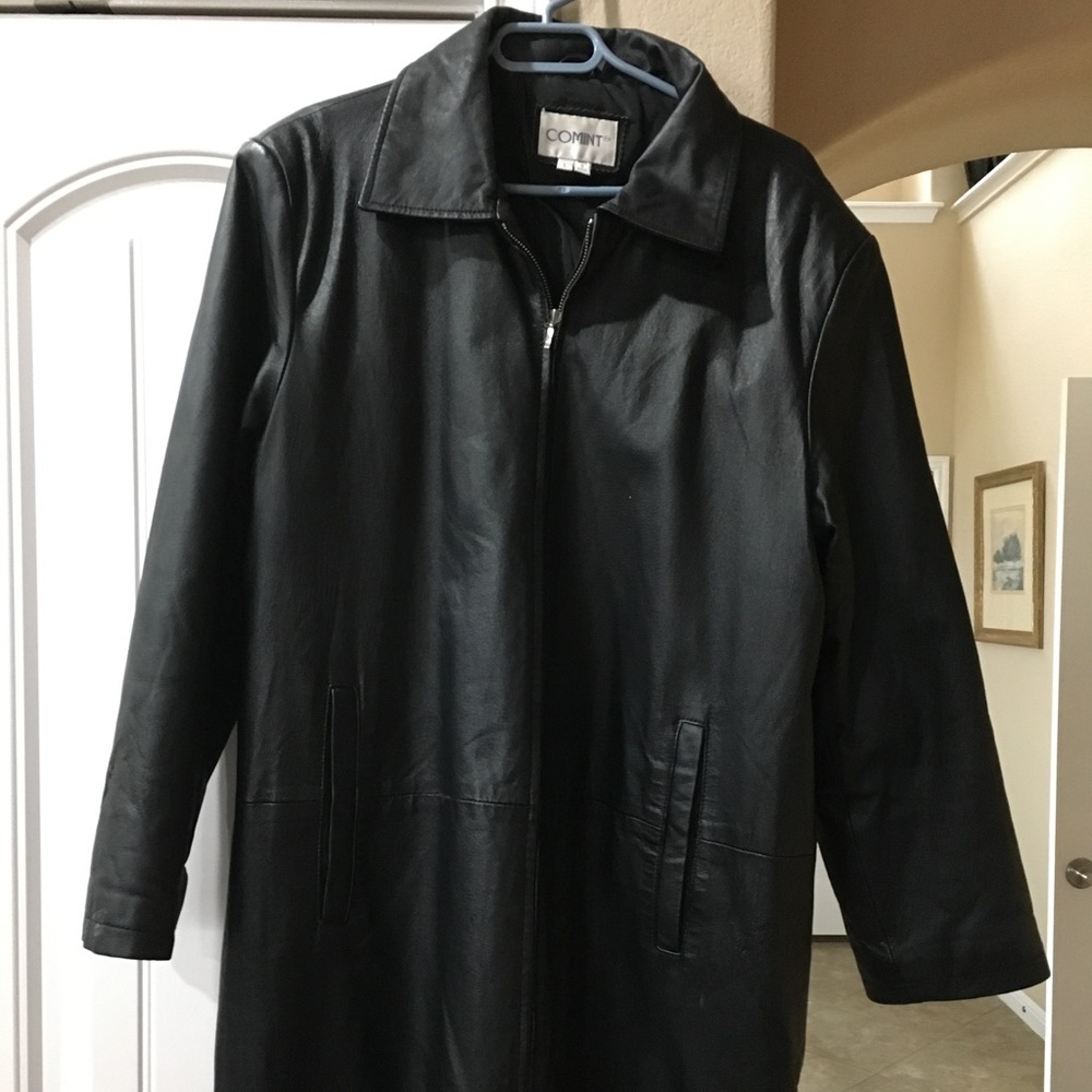 Woman's long black leather coat